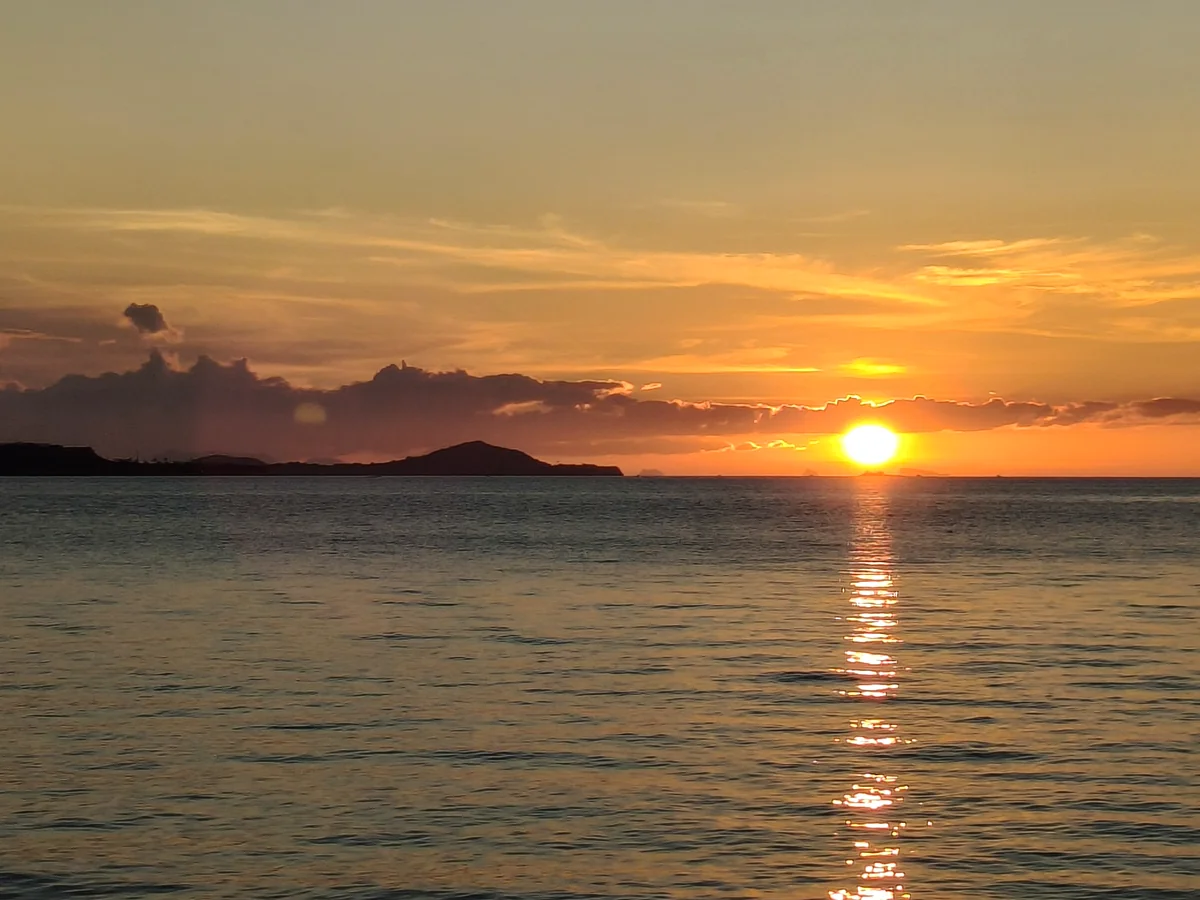 Sun setting over the sea near KOBORI
