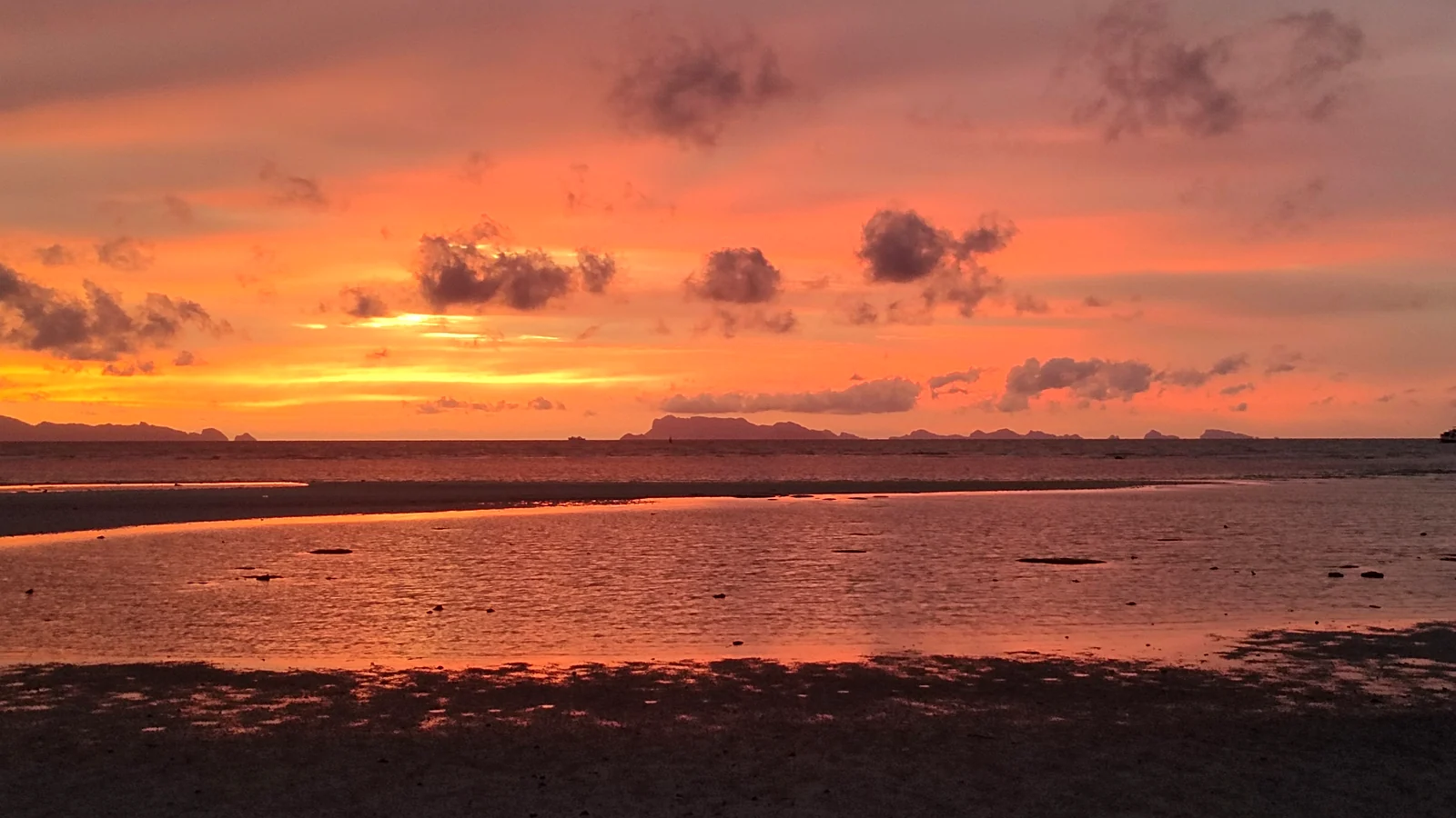 Sunset over the sea in front of KOBORI